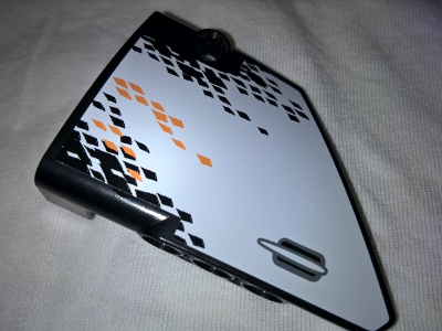 Lego Technic, Panel Fairing #13 Large Short Smooth, Side A with Door Handle and Black and Orange Rhombuses Pattern (Sticker) - Set 9398