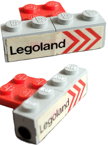 Lego Stickered Assembly 4 x 3 x 1 with 'Legoland' and Red Chevrons on Side and Black Dot Pattern on Both Ends Model Right Side (Stickers) - Set 687