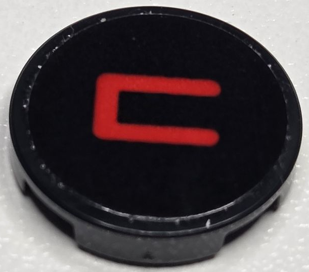 Lego Tile, Round 2 x 2 with Bottom Stud Holder with Red Capital Letter C Pattern (Sticker) - Set 40769 / Black