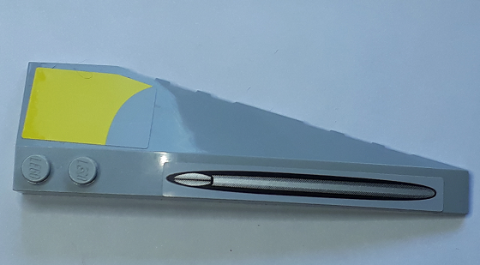 Lego Wedge 10 x 3 Left with Cannon Ridge and Yellow Pattern (Stickers) - Set 7877 / Light Bluish Gray