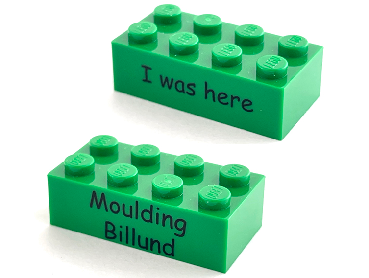 Lego Brick 2 x 4 with Kornmarken Factory Tour Black 'I was here' and 'Moulding Billund' Pattern on Opposite Sides