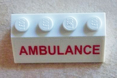 Lego Slope 45 2 x 4 with Red 'AMBULANCE' Pattern (Sticker) - Set 60023 / White