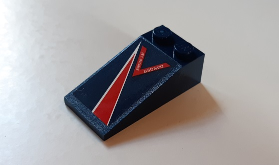 Lego Slope 18 4 x 2 with Red Lightning and 'Danger Jet Intake' Pattern Model Left Side (Sticker) - Set 60177