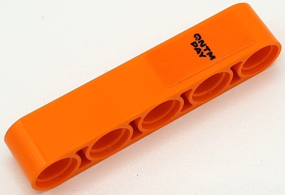 Lego Technic, Liftarm Thick 1 x 5 with Black 'QNTM PAY' Pattern (Sticker) - Set 42141 (First Version) / Orange
