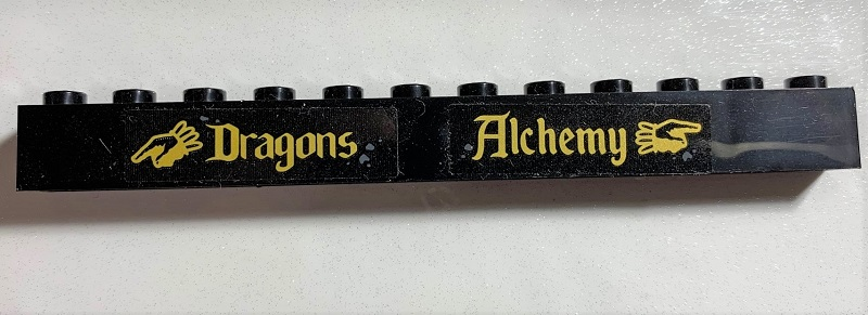 Lego Brick 1 x 12 with 'Dragons', 'Alchemy', and Pointing Hands Pattern (Stickers) - Set 75978 / Black