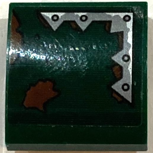 Lego Slope, Curved 2 x 2 x 2/3 with Silver Metal Plate with Spikes and Rivets and Reddish Brown Mud Splotches Pattern Model Right Side (Sticker) - Set 70434