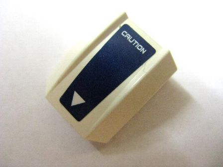 Lego Slope, Curved 2 x 2 Lip with 'CAUTION' and Small Triangle White on Dark Blue Pattern (Sticker) - Set 8103