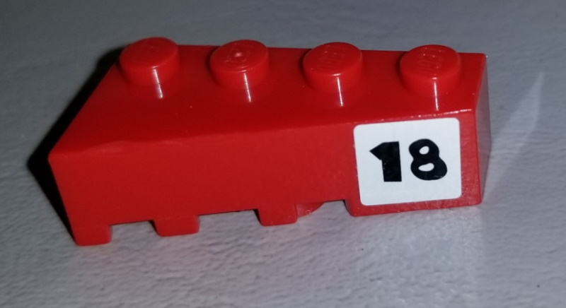 Lego Wedge 4 x 2 Right with Black '18' on White Background Pattern (Sticker) - Set 4982