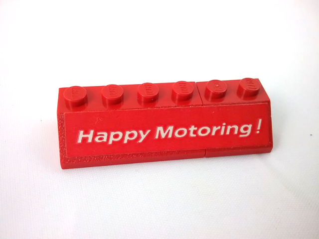 Lego Stickered Assembly 6 x 2 x 1 with 'Happy Motoring !' Pattern Model Left Side (Sticker) - Set  554