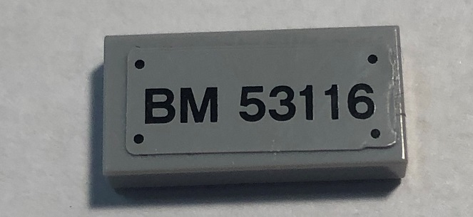 Lego Tile 1 x 2 with 'BM 53116' Pattern (Sticker) - Set 79116 / Light Bluish Gray