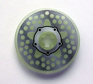 Lego Technic, Disk 3 x 3 with Silver Disk Brake Hub with Black Bolts Pattern (Sticker) - Set 8645 / Glow In Dark Trans