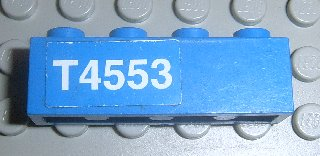 Lego Brick 1 x 4 with White 'T4553' Left Pattern (Sticker) - Set 4553 / Blue