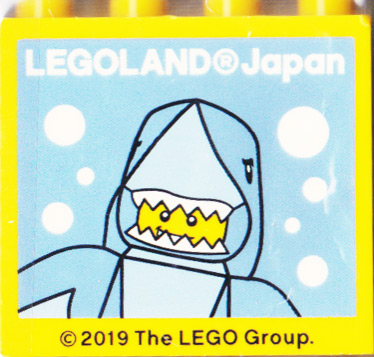 Lego Brick 2 x 4 x 3 with LEGOLAND Japan, Shark Suit Guy Minifigure Facing Forward, and Bubbles Pattern / Yellow