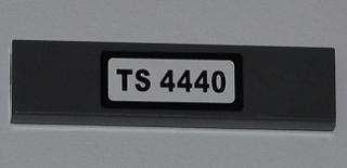 Lego Tile 1 x 4 with 'TS 4440' Pattern (Sticker) - Set 4440 / Dark Bluish Gray