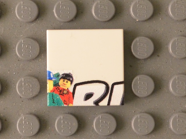 Lego Tile 2 x 2 with Minifigures and Black 'RL' Upper Half Pattern