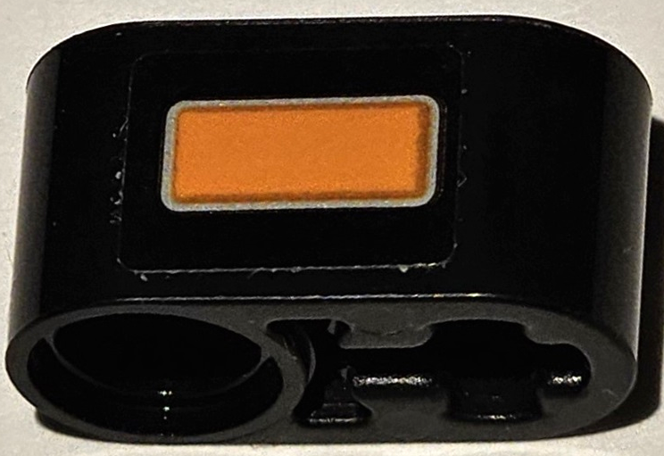 Lego Technic, Liftarm Thick 1 x 2 - Axle Hole with Orange Blinker Light with Silver Outline Pattern (Sticker) - Set 42111 / Black