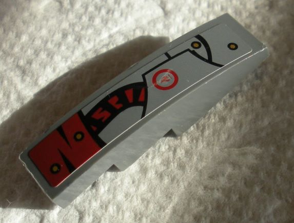 Lego Slope, Curved 4 x 1 with Dark Red Curved Tube and Hull Plates Pattern Model Left Side (Sticker) - Set 70012-2