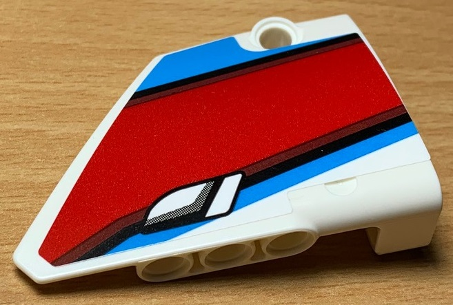 Lego Technic, Panel Fairing #14 Large Short Smooth, Side B with Red, Black and Blue Lines and Door Handle Pattern (Sticker) - Set 42077 / White