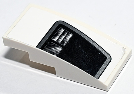 Lego Slope, Curved 4 x 2 with Black and Silver Trapezoid Rear Window and Air Vent Pattern Model Right Side (Sticker) - Set 75888