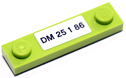 Lego Plate, Modified 1 x 4 with 2 Studs without Groove with Black 'DM 25 1 86' on White Background Pattern (Sticker) - Set 75888