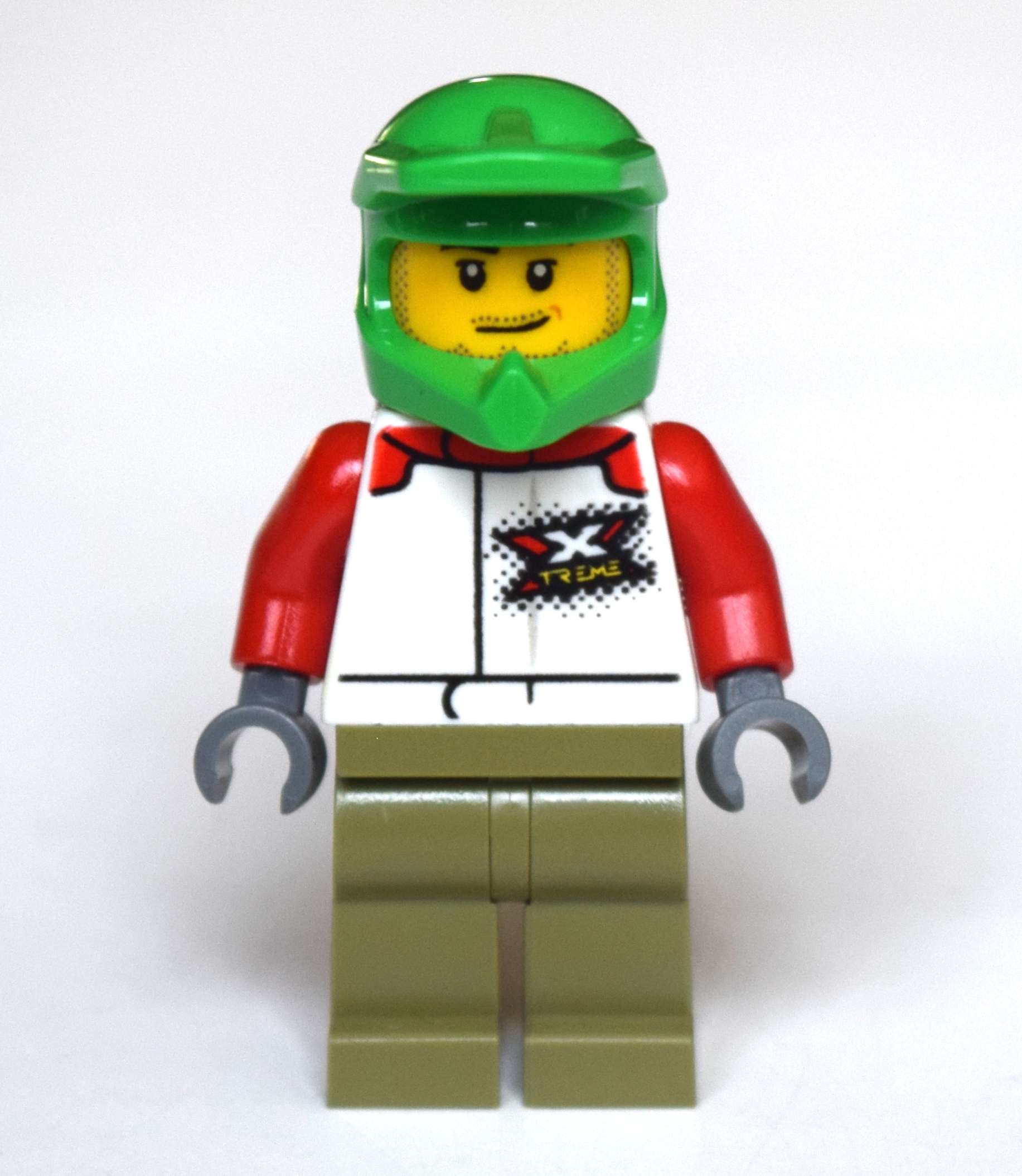 Lego Man, White Racing Jacket, Olive Green Legs, Green Dirt Bike Helmet, Stubble