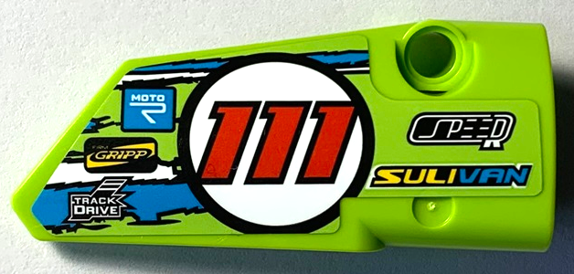 Lego Technic, Panel Fairing # 4 Small Smooth Long, Side B with 'SPEED', 'SULIVAN', 'MOTOR', 'FIRM GRIPP', 'TRACK DRIVE', Red '111' in Circle and Blue and White Stripes Pattern (Sticker) - Set 42103 / Lime