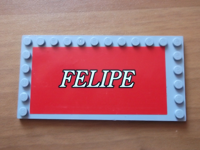 Lego Tile, Modified 6 x 12 with Studs on Edges with White 'FELIPE' on Red Background Pattern (Sticker) - Set 8144 / Light Bluish Gray