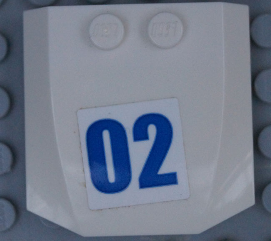Lego Wedge 4 x 4 x 2/3 Triple Curved with Blue Number 02 on White Background Pattern (Sticker) - Set 60138 / White
