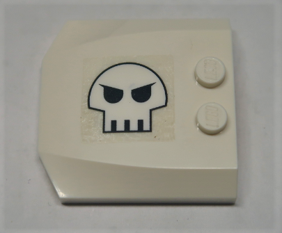 Lego Wedge 4 x 4 x 2/3 Triple Curved with Skull Pattern Model Left Side (Sticker) - Set 10192