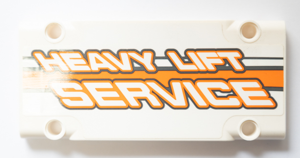 Lego Technic, Panel Plate 5 x 11 x 1 with 'HEAVY LIFT SERVICE' and Dark Bluish Gray and Orange Stripes  Pattern Model Right Side (Sticker) - Set 42052 / White
