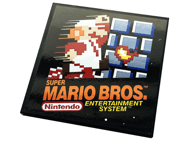 Lego Tile 6 x 6 with Bottom Tubes, Textured Surface with Game Cartridge 'SUPER MARIO BROS.', Nintendo Logo, and 'ENTERTAINMENT SYSTEM' Pattern (Sticker) - Set 71374