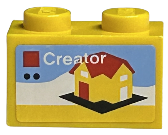 Lego Brick 1 x 2 with LEGO Creator Set Box Art, Yellow House with Red Roof and Door on Black Baseplate Pattern (Sticker) - Sets 40145 / 40305 and Gear 40359 / Yellow