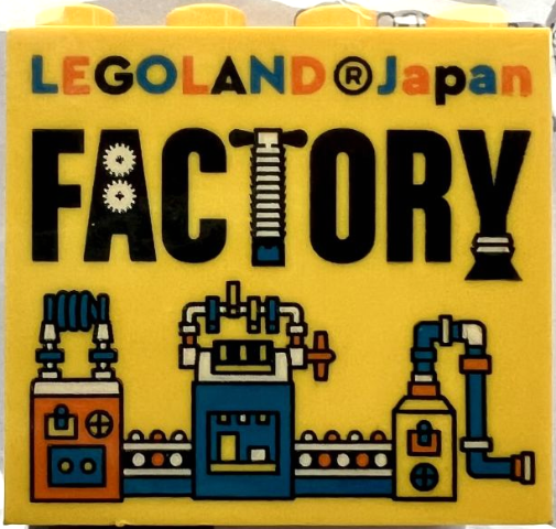 Lego Brick 2 x 4 x 3 with LEGOLAND Japan, Black 'FACTORY', and Orange, Blue, and White Machine Pattern