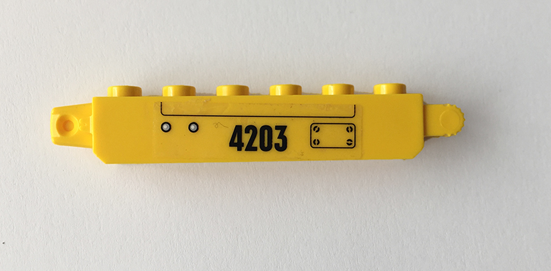 Lego Hinge Brick 1 x 6 Locking with Panel, Black '4203', and Rivets Pattern Model Left Side (Sticker) - Set 4203 / Yellow
