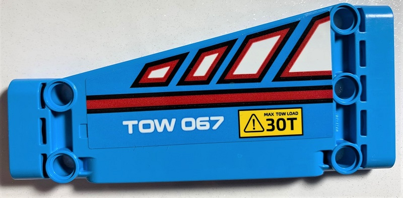 Lego Technic, Panel Plate 5 x 11 x 1 Tapered with White Polygons Outlined in Red, Red Line, 'TOW 067' and 'MAX TOW LOAD 30T' Pattern Model Right Side (Sticker) - Set 42070 / Dark Azure