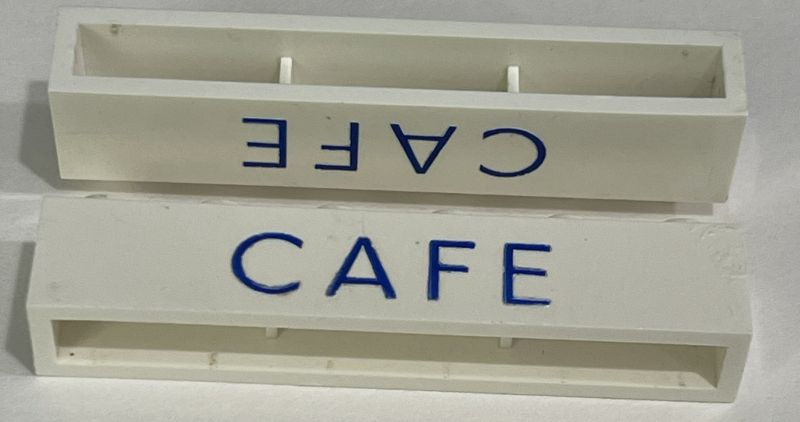 Lego Brick 1 x 6 without Bottom Tubes with Cross Side Supports with Blue 'CAFE' Sans-Serif Thin (Letters Close) Pattern