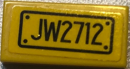 Lego Tile 1 x 2 with Black 'JW2712' Pattern (Sticker) - Set 75926 / Yellow