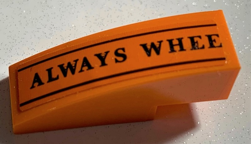 Lego Slope, Curved 3 x 1 with Black 'ALWAYS WHEE' and Lines Pattern (Sticker) - Set 75978 / Orange