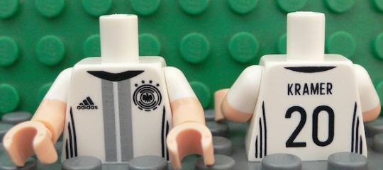 Lego Torso Soccer Shirt with Adidas Logo, 4 Stars and Eagle Front, 'KRAMER 20' Back Pattern / Light Nougat Arms with Molded White Short Sleeves Pattern / Light Nougat Hands