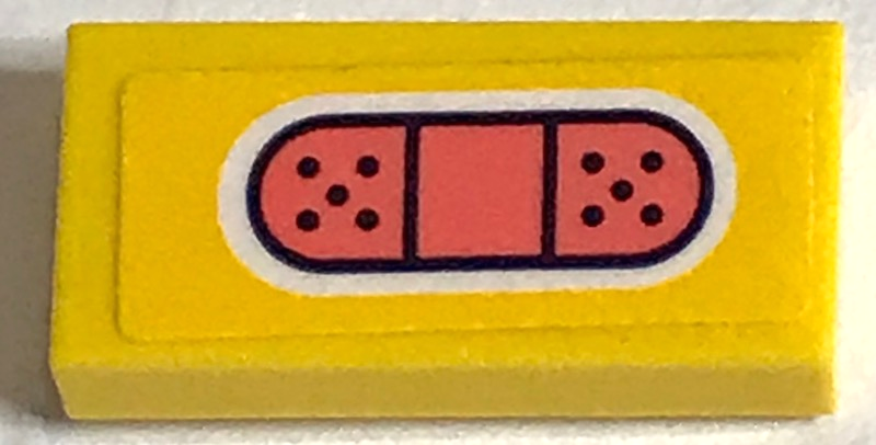 Lego Tile 1 x 2 with Coral Bandage on Yellow Background Pattern (Sticker) - Set 41380 / Yellow