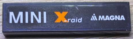 Lego Tile 1 x 4 with White 'MINI', X-raid and MAGNA Logos Pattern Model Right Side (Sticker) - Set 75894 / Black
