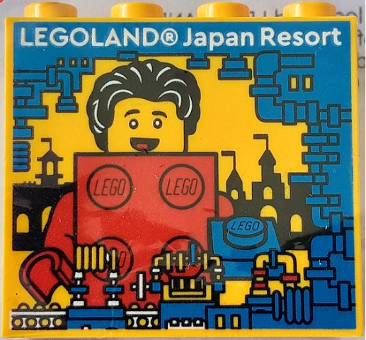 Lego Brick 2 x 4 x 3 with LEGOLAND Japan Resort, Red Brick Suit Guy Minifigure, Blue Machine and Black Castle Silhouette Pattern / Yellow