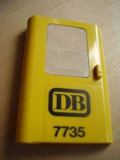 Lego Door 1 x 4 x 5 Train Left, Thin Support at Bottom with Black 'DB 7735' Pattern (Sticker) - Set 7735