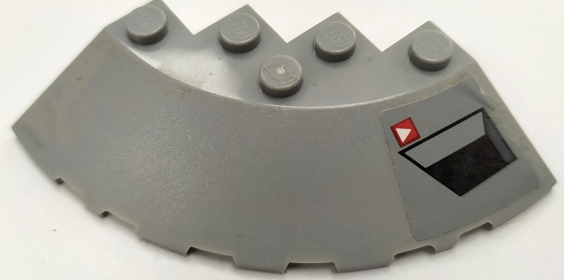 Lego Brick, Round Corner 6 x 6 with Slope 33 Edge, Facet Cutout with Black Vent and White Triangle on Red Square Pattern Model Left Side (Sticker) - Set 75150