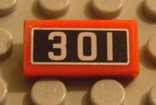 Lego Tile 1 x 2 with '301' Pattern (Sticker) - Set 10020 / Red