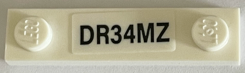 Lego Plate, Modified 1 x 4 with 2 Studs with Groove with Black 'DR34MZ' Pattern (Sticker) - Set 71475 / White