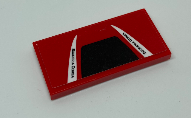 Lego Tile 2 x 4 with Black Trapezoid and 'SCUDERIA CORSA' on White Triangles Pattern (Sticker) - Set 75886 / Red