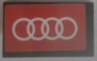 Lego Panel 1 x 2 x 1 with White Audi Logo on Red Background Pattern (Sticker) - Set 75873 / Black