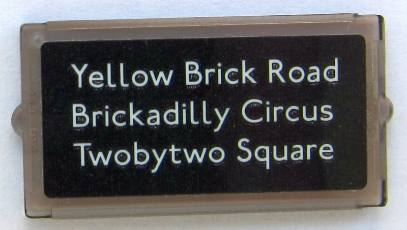 Lego Glass for Window 1 x 2 x 3 with 'Yellow Brick Road', 'Brickadilly Circus' and 'Twobytwo Square' Pattern (Sticker) - Set 10258 / Trans-Brown