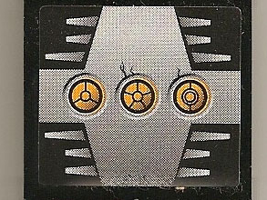 Lego Panel 1 x 4 x 3 - Hollow Studs with 3 Yellow Circles with Bionicle Code B on Silver Background Pattern (Sticker) - Set 8758 / Black